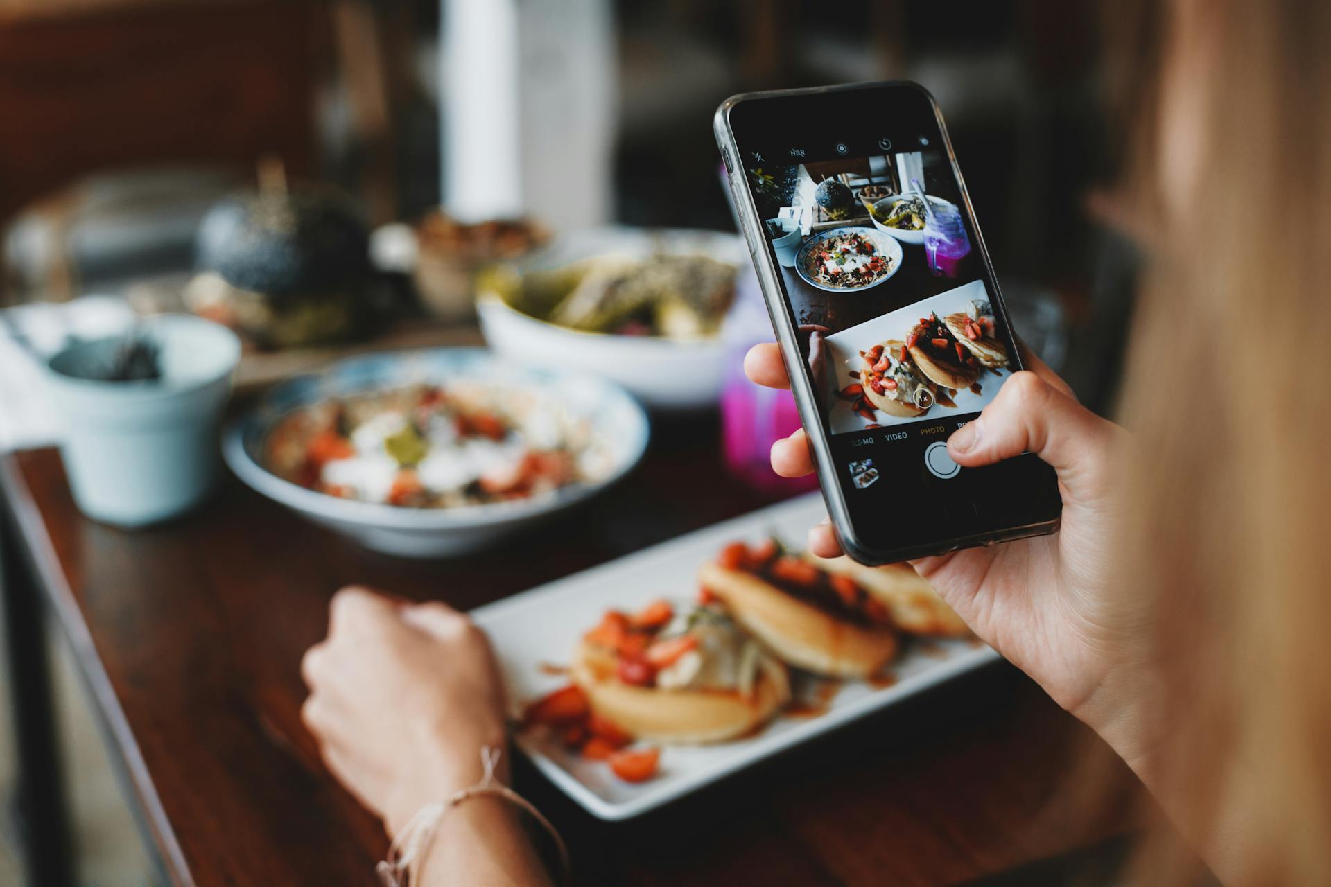 Restaurant table setting photographed from above with Instagram interface overlay